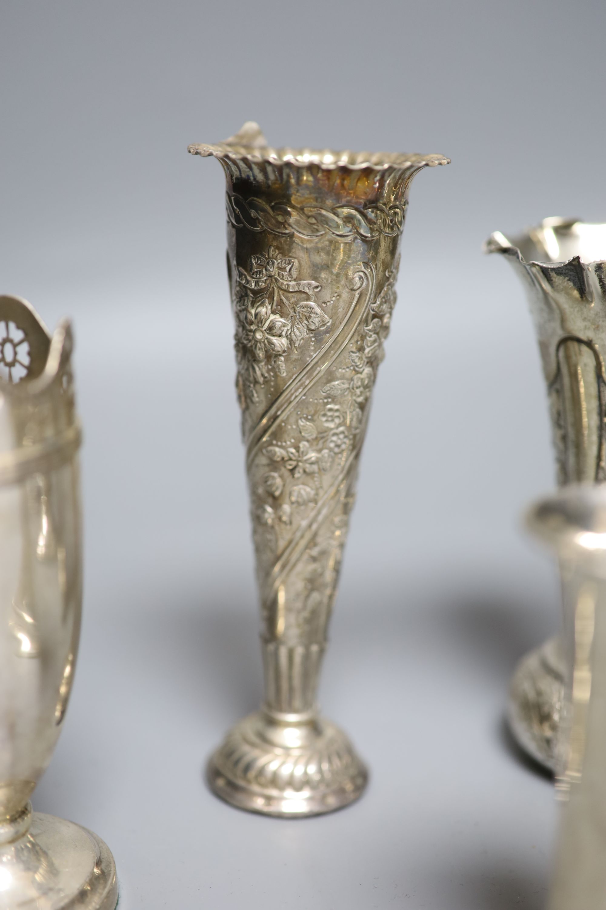 Seven assorted Victorian and later silver posy vases, largest 16.5cm, all weighted.